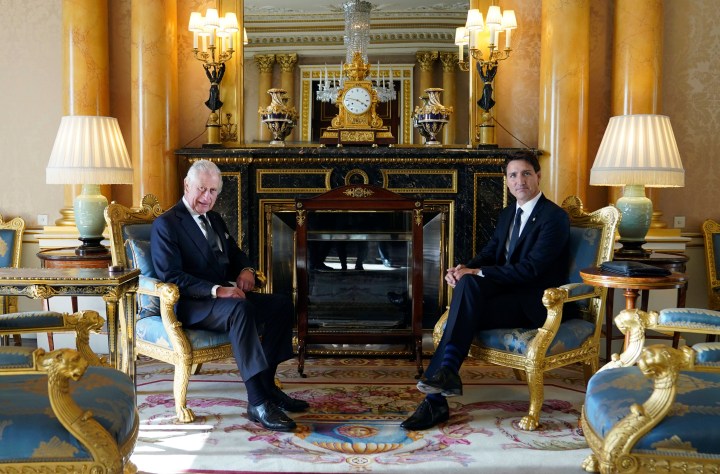  Britain's King Charles III sits with Prime Minister of Canada Justin Trudeau, as he receives realm prime ministers in the 1844 Room at Buckingham Palace in London, Saturday, Sept. 17, 2022.