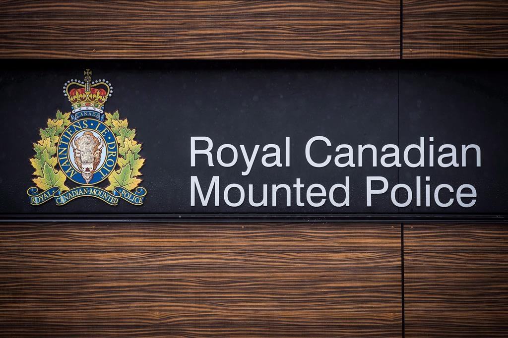 The RCMP logo is seen outside Royal Canadian Mounted Police "E" Division Headquarters, in Surrey, B.C., on April 13, 2018.