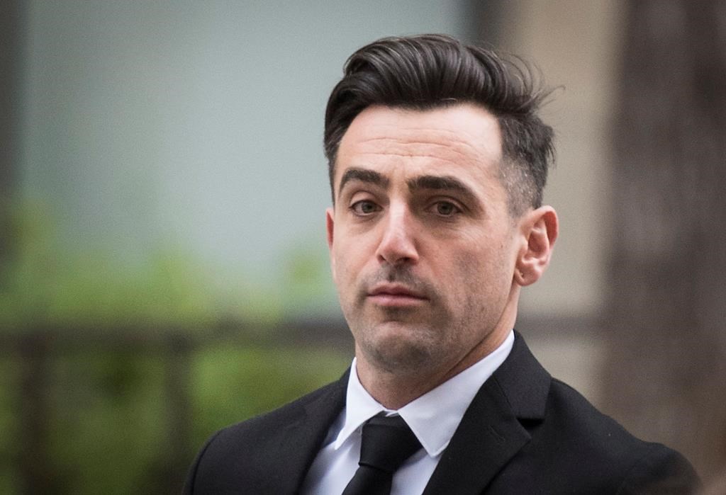 Canadian musician Jacob Hoggard arrives at the Toronto courthouse for sentencing after being found guilty earlier this year of sexually assaulting an Ottawa woman, on Thursday, October 20, 2022. THE CANADIAN PRESS/ Tijana Martin.