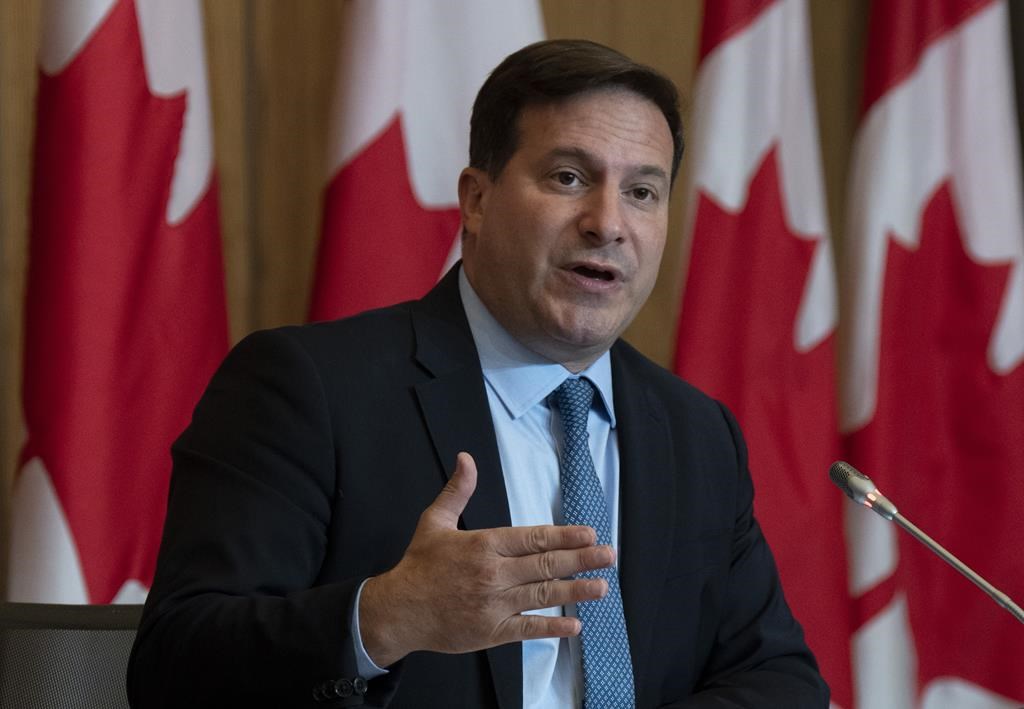 Marco Mendicino speaks during a news conference, Monday, Sept. 26, 2022 in Ottawa. The federal government says measures to freeze the number of handguns in Canada are now in effect. 