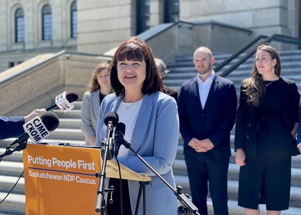 Saskatchewan NDP Opposition Leader Carla Beck speaks to media at the Saskatchewan Legislature, in Regina, Monday, June 27, 2022. THE CANADIAN PRESS/Mickey Djuric.