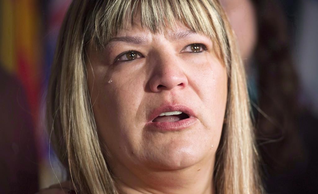 A tear rolls down the cheek of Bernadette Smith, from Winnipeg, as she talks about the Missing and Murdered Indigenous Women inquiry in this file photo. The MLA was reelected on Tuesday and says the new NDP government will stick to a promise to search a landfill for the remains of missing Morgan Harris and Marcedes Myran.