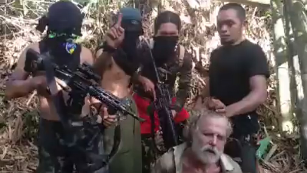 Ben Tattoo, right, in video released by Abu Sayyaf.