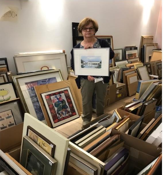 Bev Bryce in storage area.