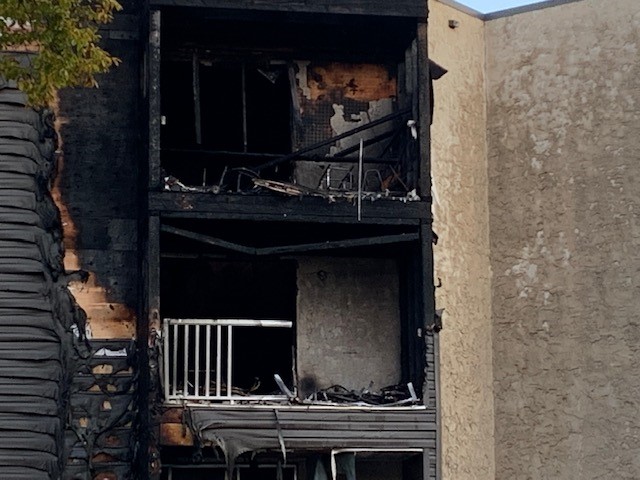Fire damaged an apartment building at 10368 92 St. in Edmonton's Boyle Street neighbourhood on Monday, Oct. 17, 2022.