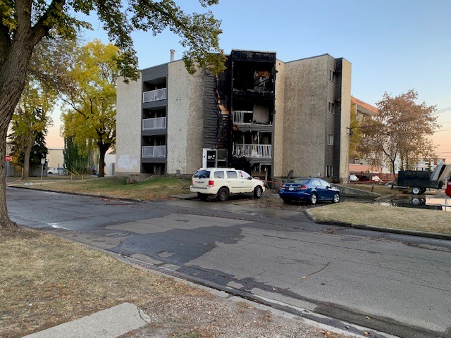 Fire damaged an apartment building at 10368 92 St. in Edmonton's Boyle Street neighbourhood on Monday, Oct. 17, 2022.