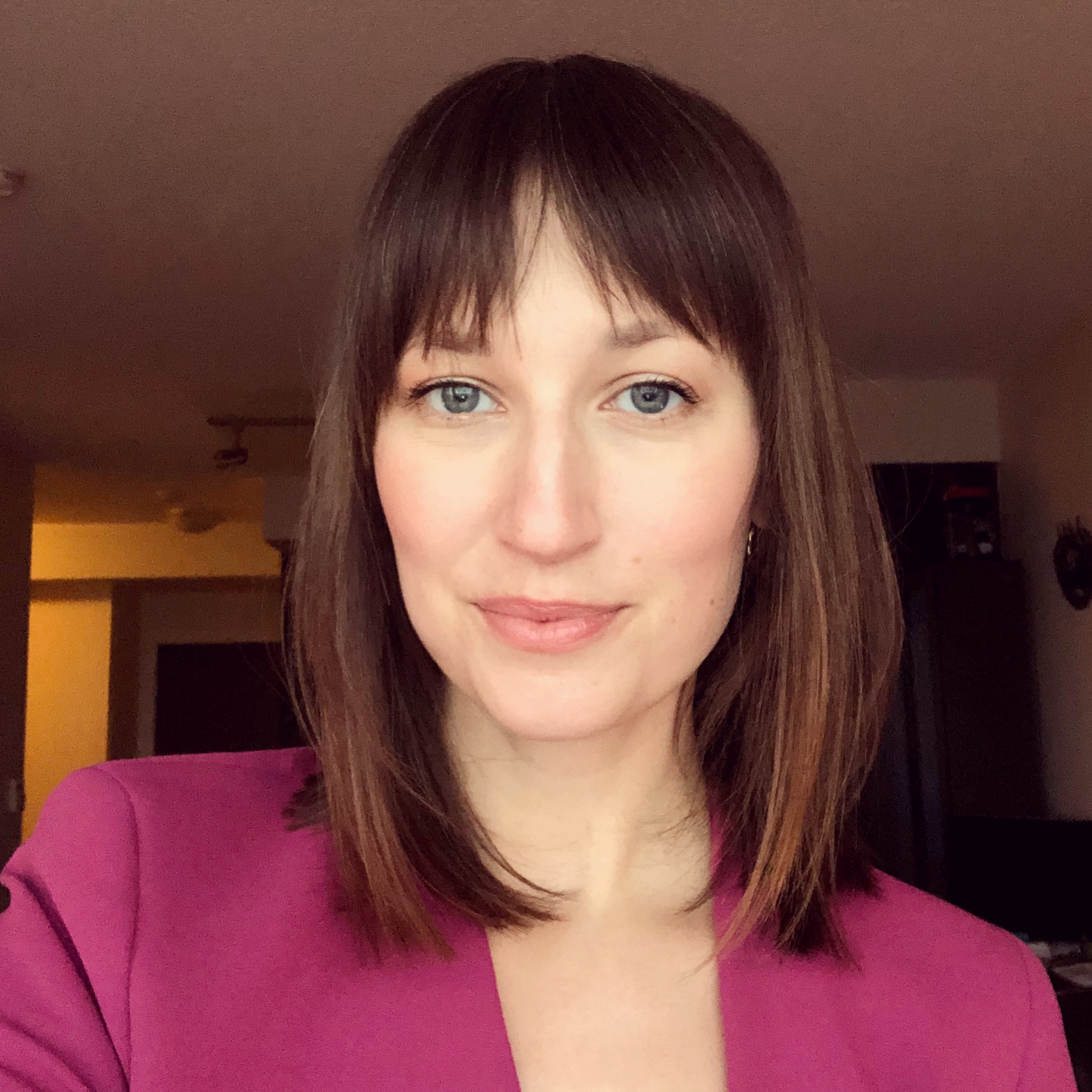 Rebecca Grundy appears in a headshot.