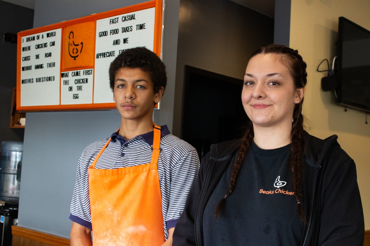 Tayden Thompson Gray (left) and Breanne Colins (right) are two employees at Beaks Chicken, a local restaurant in Regina. 