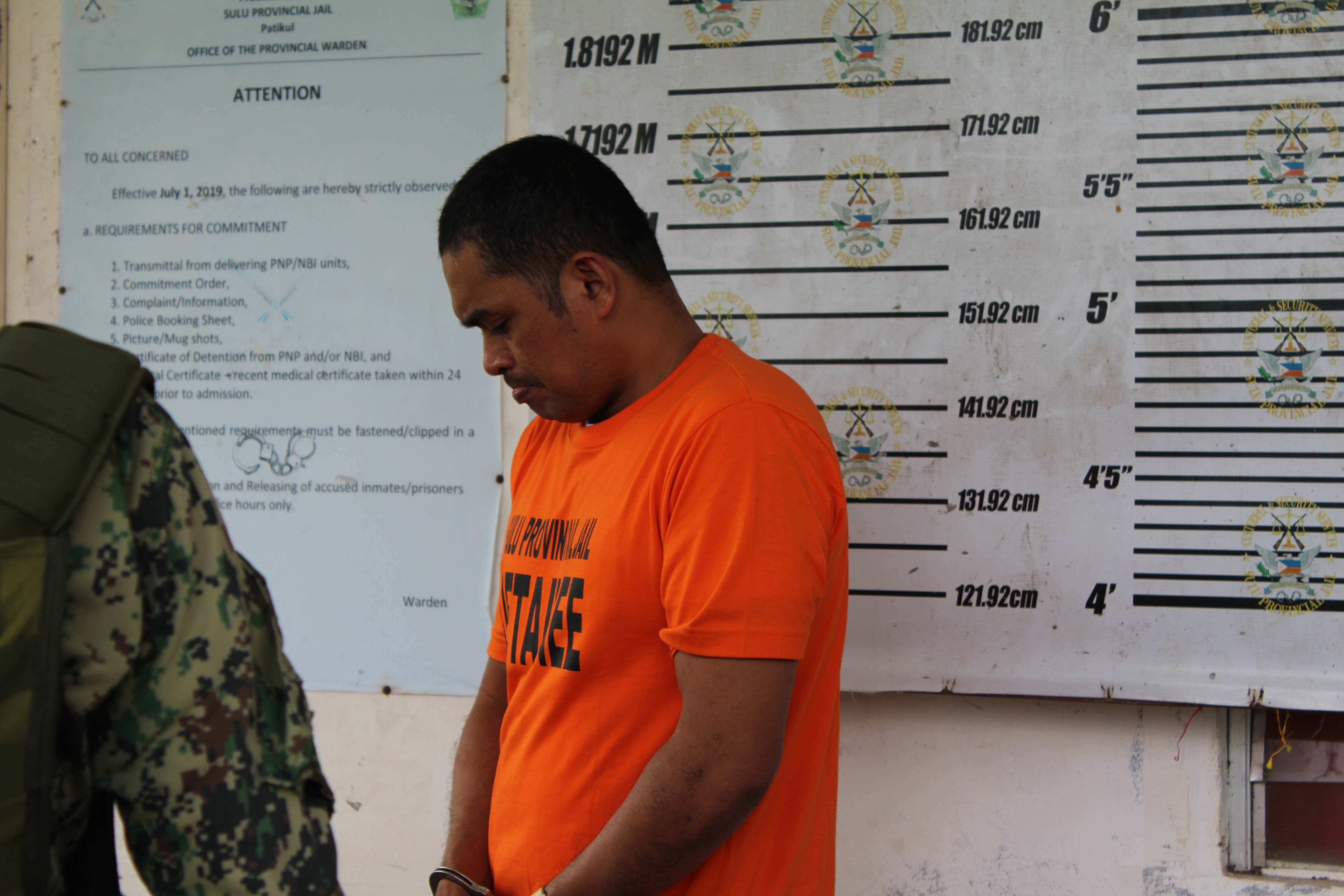 Police take mug shots of Ben Tattoo after charging him with kidnapping, Oct. 4, 2022.