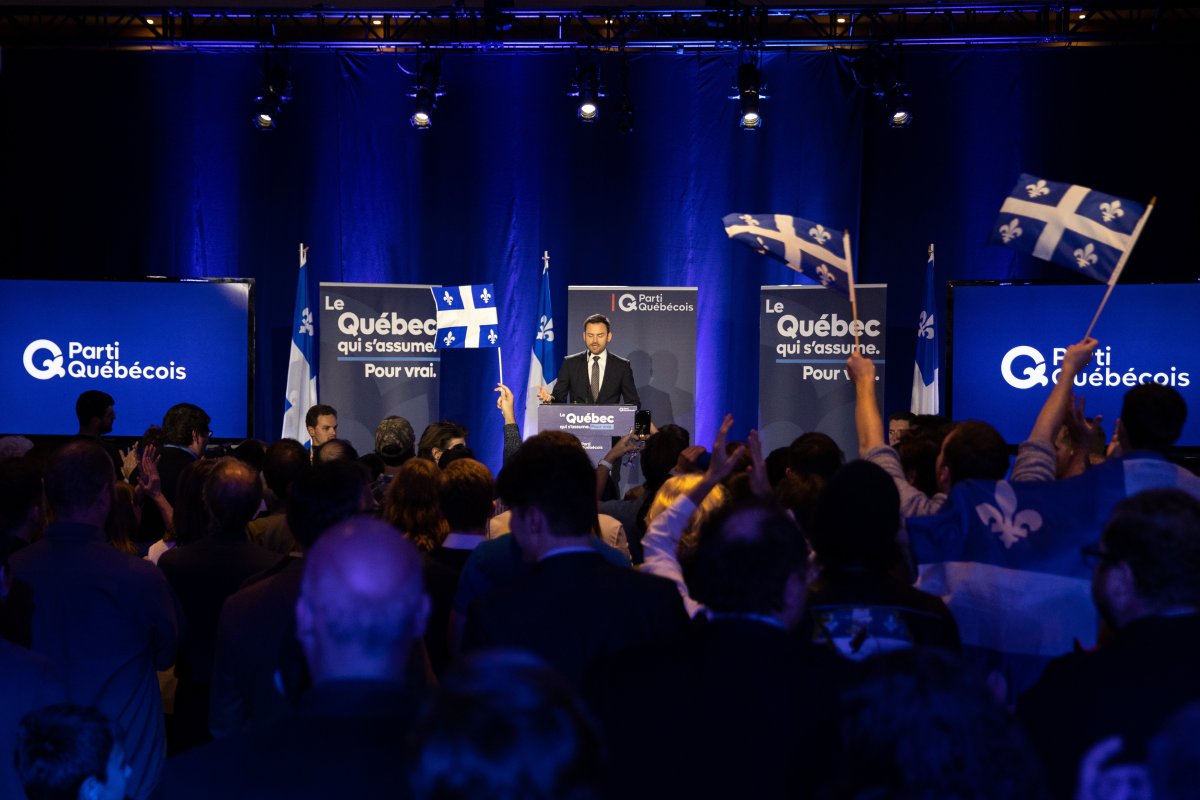 Parti Quebecois Leader Paul St-Pierre Plamondon speaks to supporters following his loss in the provincial election to a majority CAQ government in Boucherville, Que., Monday, Oct. 3, 2022.