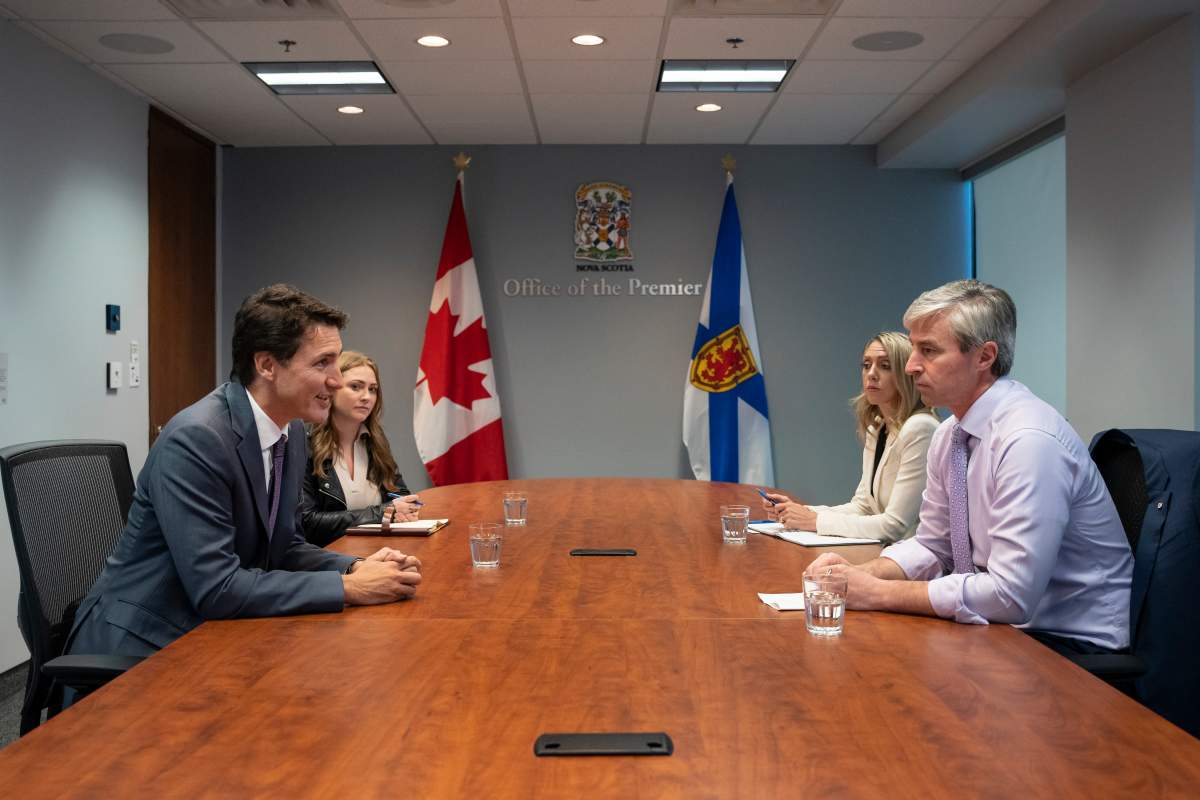 Prime Minister Justin Trudeau, left, meets with Nova Scotia Premier Tim Houston in Halifax on Tuesday, October 4, 2022. THE CANADIAN PRESS/Darren Calabrese