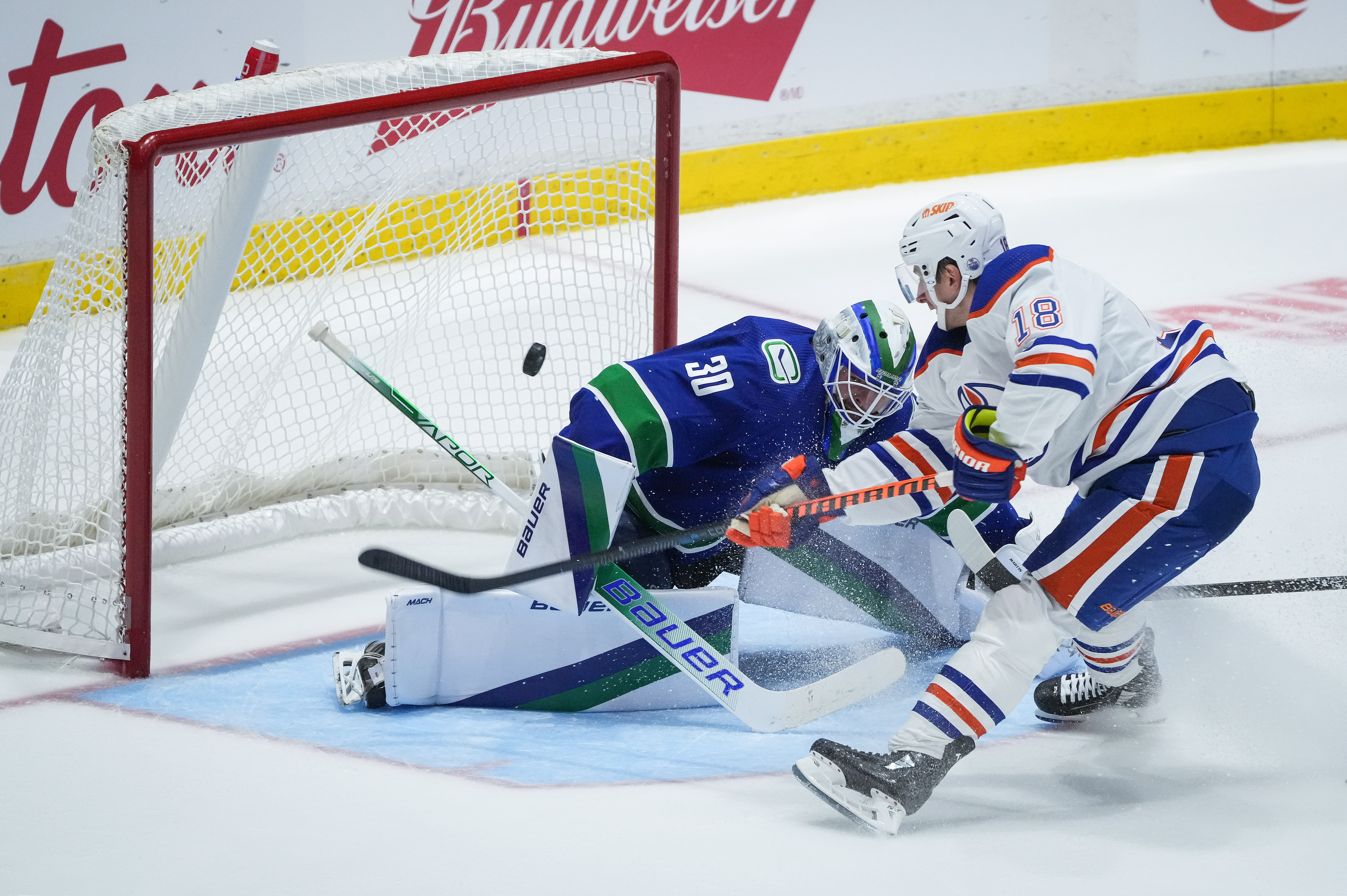 Poolman, Luoto shine as Jets drop preseason opener to Oilers