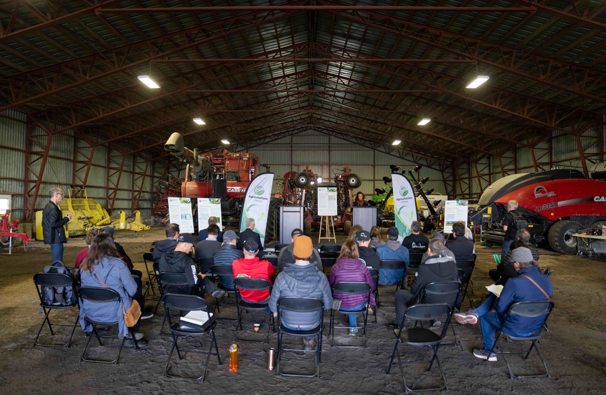 Local farmers attend a presentation on climate adaptation for farming at the J.N. Beauchemin et Fils farm in Saint-Ours, Que., Thursday, Oct. 13, 2022.