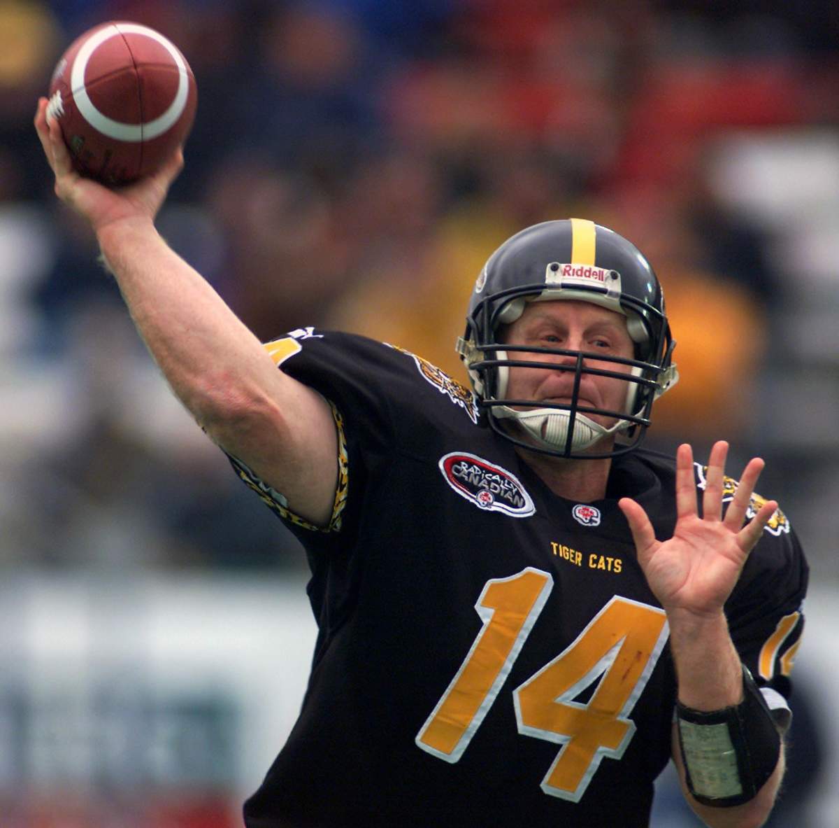 Hamilton Tiger-Cats quarterback Danny McManus launches a pass during CFL Eastern semi-final action against the Winnipeg Blue Bombers in Hamilton, Sunday Nov. 12, 2000.