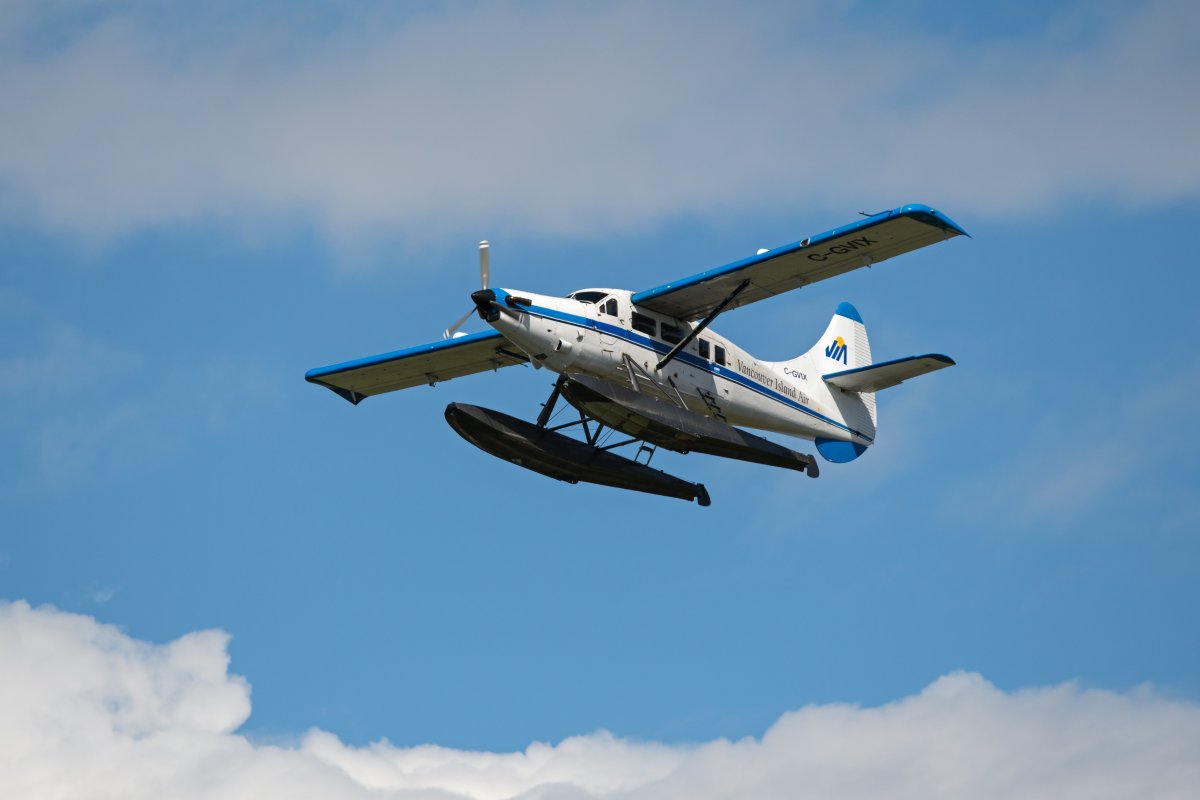 A Vancouver Island Air DHC-3T De Havilland Canada turbine Otter floatplane (C-GVIX)) airborne after take-off from the Vancouver International Water Airport, located on the Fraser River, adjacent to the South Terminal of Vancouver International Airport, Richmond, B.C., on Saturday, August 13, 2022. 