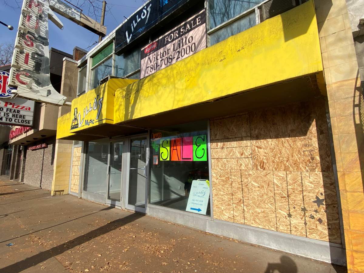 Plywood in place of windows on Whyte Avenue