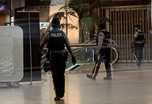 Police inside Metrotown Mall on Wednesday evening. 