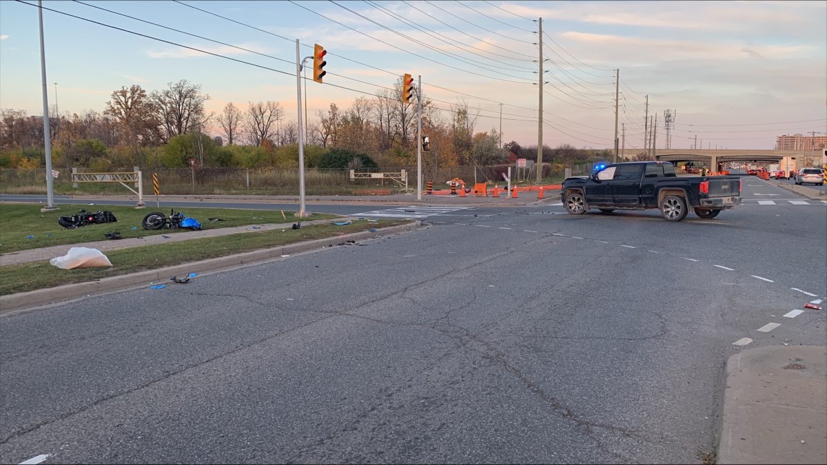 Pickup truck and motorcycle crash near Steeles Avenue and Highway 400 on Oct. 23, 2022.