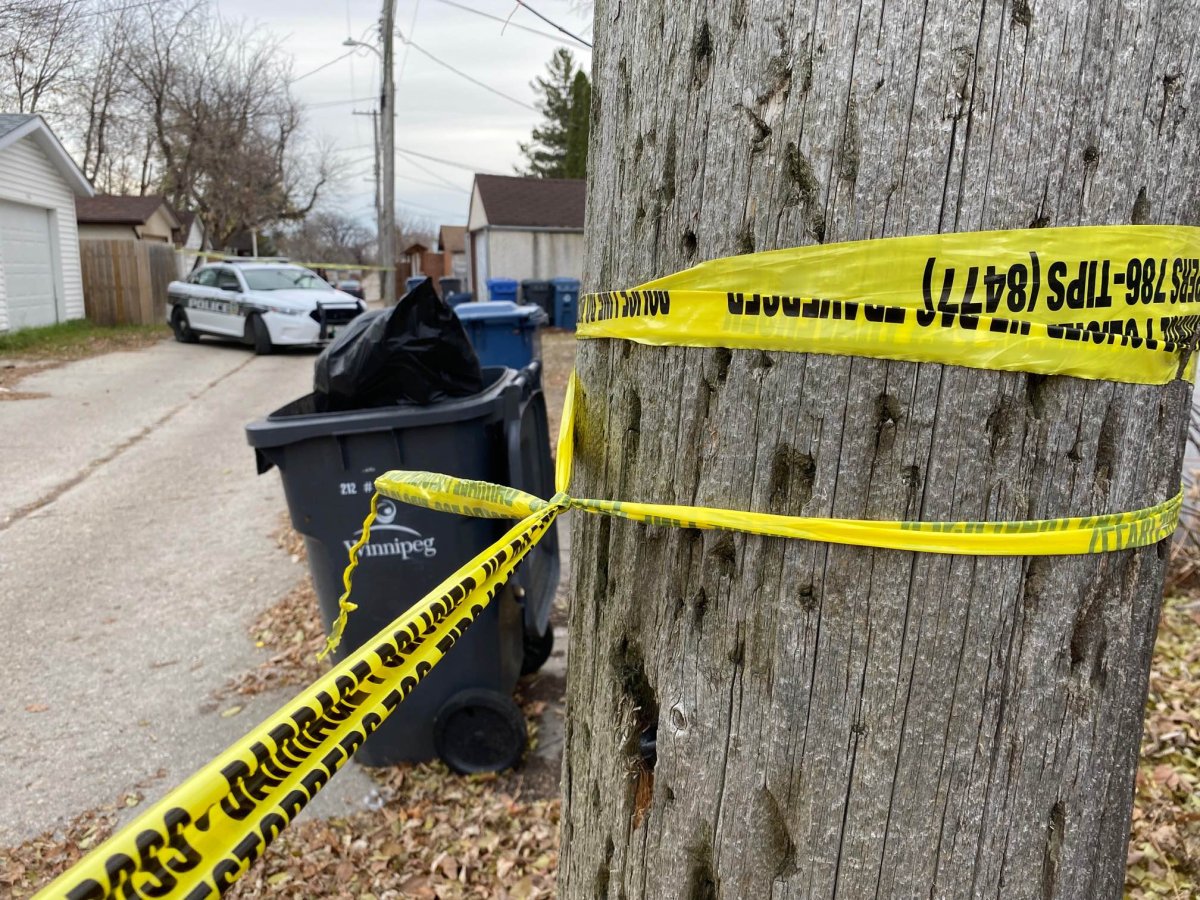 Forensics investigators at the scene of Winnipeg's 44th homicide of 2022.