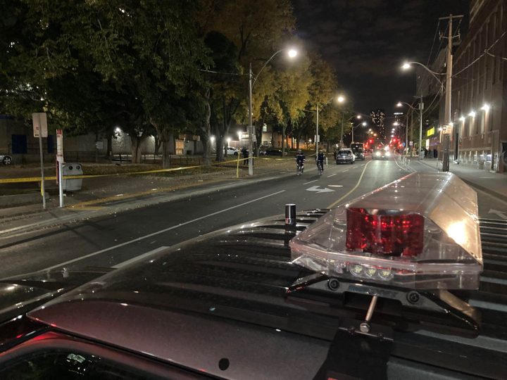 Toronto police on the scene of a shooting at Sherbourne Street and Queen Street on Tuesday.