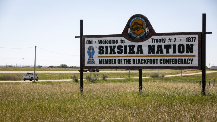 A sign greets people on the Siksika First Nation, east of Calgary near Gliechen, Alta., on June 29, 2021.Representatives from Siksika and two other First Nations in southern Alberta have filed a human rights complaint against the federal government for alleged discrimination against adults with developmental disabilities. 