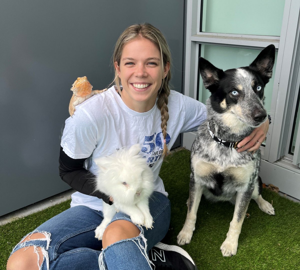 Summer Nickerson-Hagen with Kawartha Downs with some furry friends. Kawartha Downs has donated $25,000 to the Peterborough Humane Society's new animal care centre.
