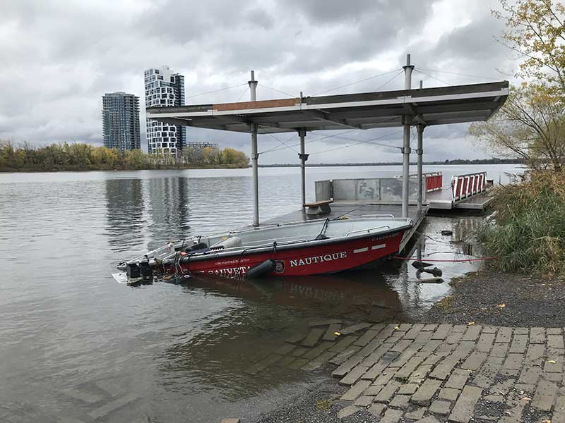 The boat that capsized pinning firefighter Pierre Lacroix under it during a water rescue in the Lachine Rapids.