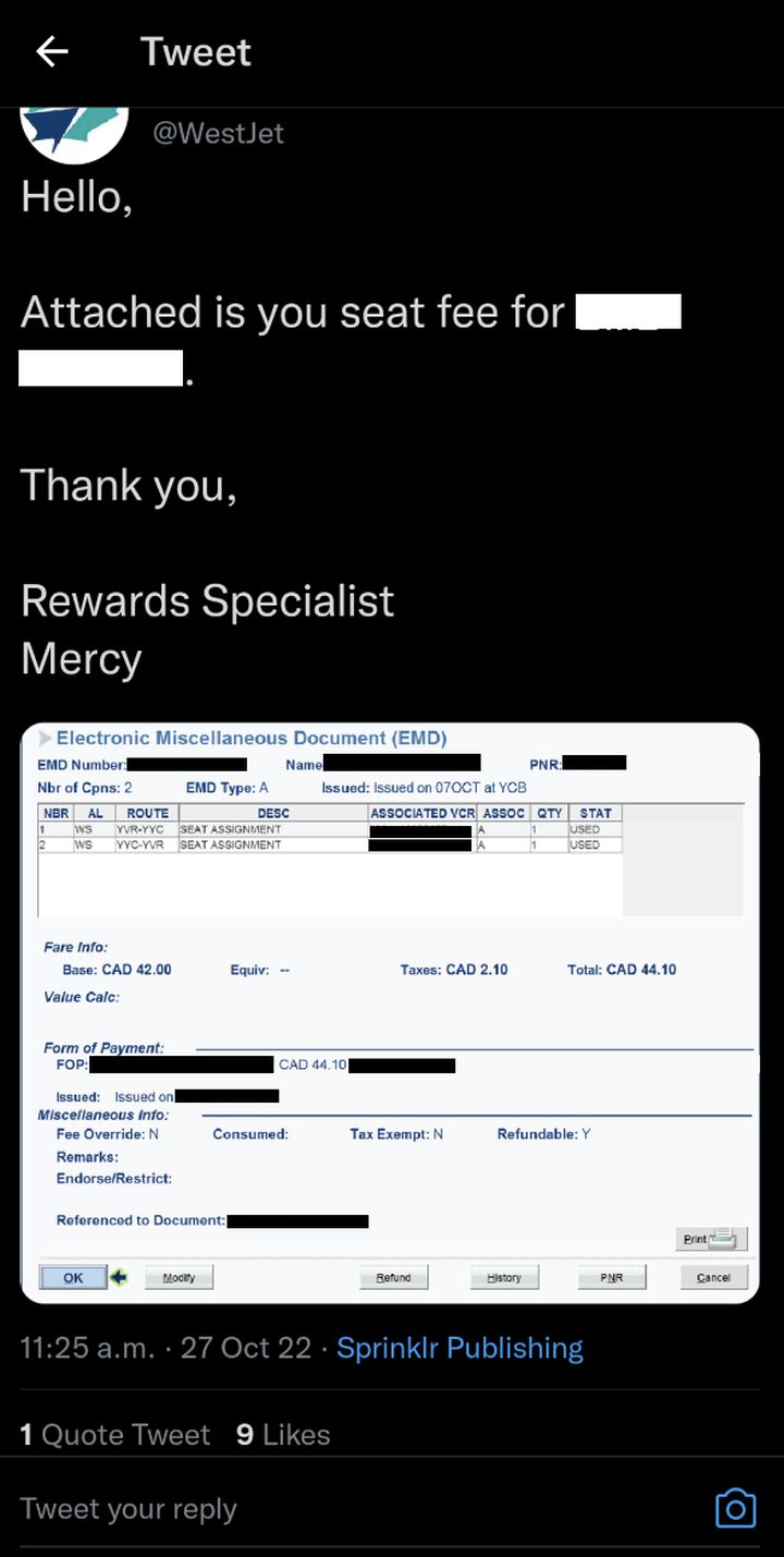 A screenshot with personal information blacked out.