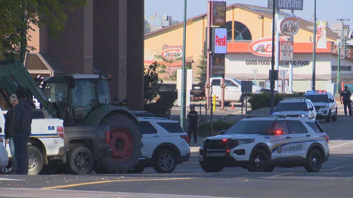 Alberta sheriff vehicles block a downtown Lethbridge street on Oct. 4, 2022.