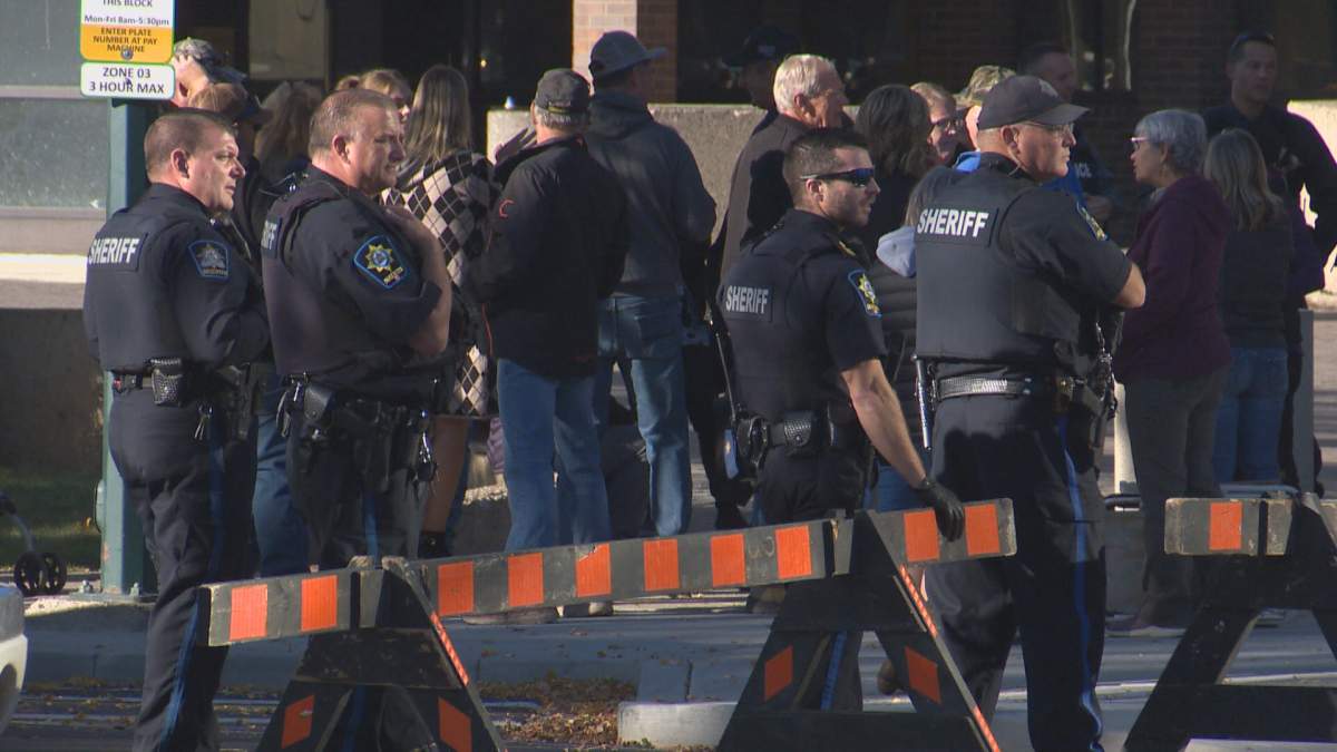 Alberta sheriffs block off a section of 4th Street South outside the Lethbridge courthouse on Oct. 4, 2022.