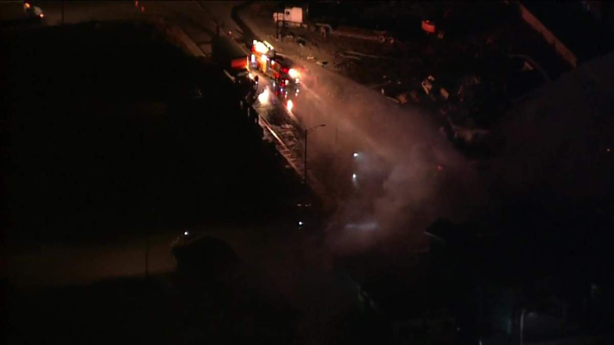 Edmonton Fire Rescue Services battle a fire at a house under construction in the city's southeast on Oct. 11, 2022.