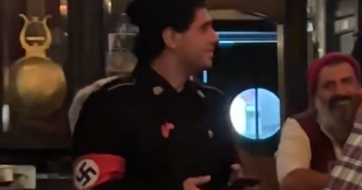 Man wearing Nazi costume booted from New York City bar in viral video – National