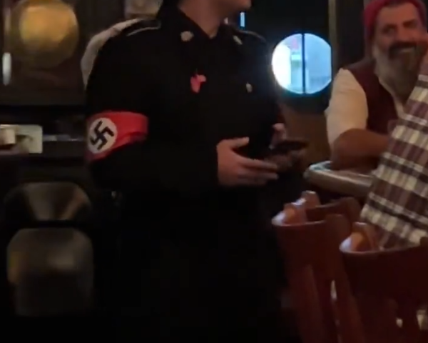 Man wearing Nazi costume booted from New York City bar in viral video