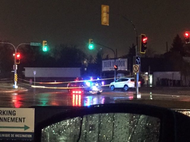 Winnipeg police on-scene Monday morning at Keewatin Street and Notre Dame Avenue, where a hit and run occurred.