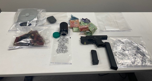 Norway House RCMP executed a warrant and seized a firearm, drugs and cash.