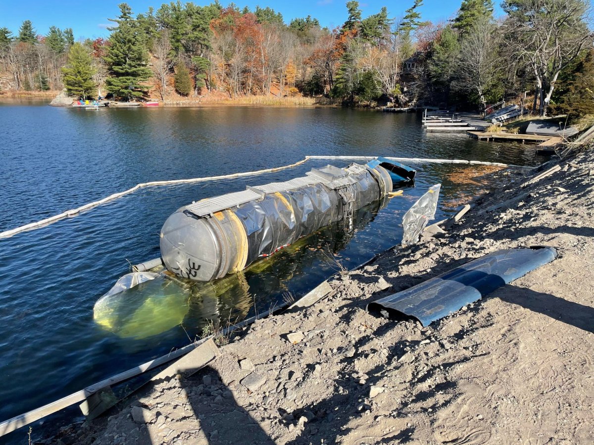 A tanker truck hauling beef fat rolled into a Kingston-area lake.