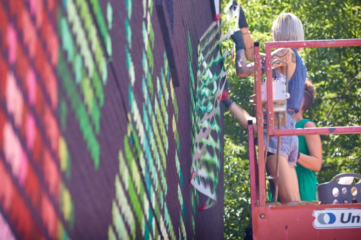 Strawberry Mural in Maple Avenue in Barrie Ontario by artist Bareket Kezwer with local artist Monica Loney.