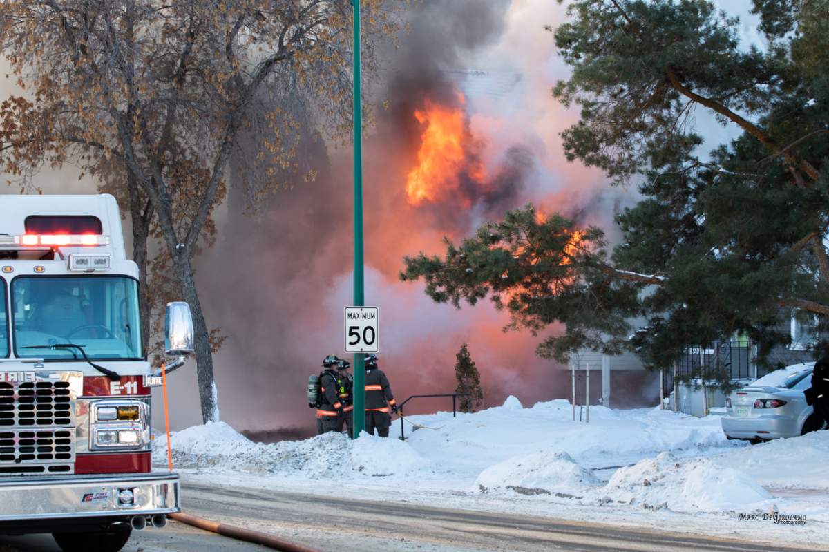 Fire crews battled a house fire in Saskatoon on Thursday.