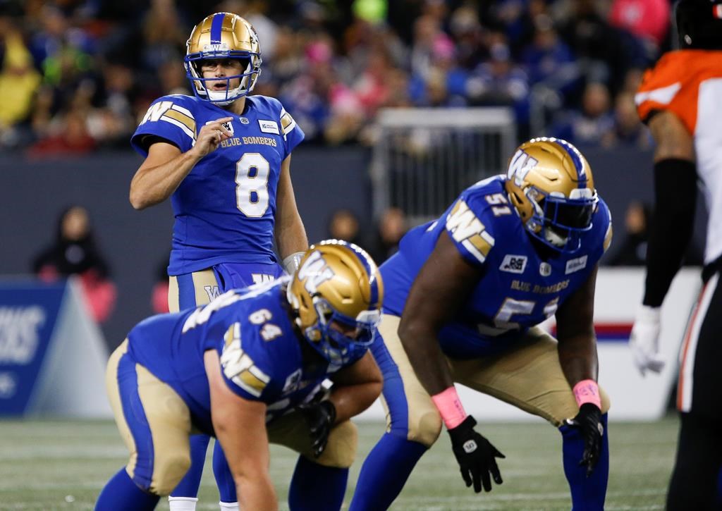 Winnipeg Blue Bombers quarterback Zach Collaros (8) calls a play against the B.C. Lions during first half CFL action in Winnipeg Friday, October 28, 2022.  