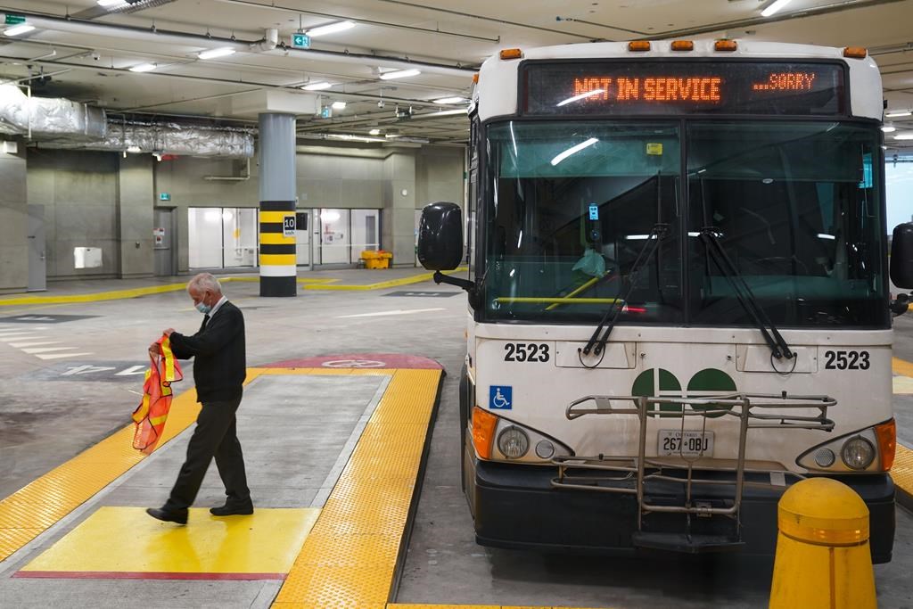 A bus driver steps off a GO Transit bus at the Union Station bus terminal in Toronto on Tuesday, November 2, 2021.<i data-stringify-type="italic" style="box-sizing: inherit; color: rgb(29, 28, 29); font-family: Slack-Lato, Slack-Fractions, appleLogo, sans-serif; font-size: 15px; font-variant-ligatures: common-ligatures; orphans: 2; widows: 2; background-color: rgb(248, 248, 248); text-decoration-thickness: initial;">Striking GO Transit workers are calling on Metrolinx to return to the negotiating table today. </i>THE CANADIAN PRESS/Evan Buhler.
