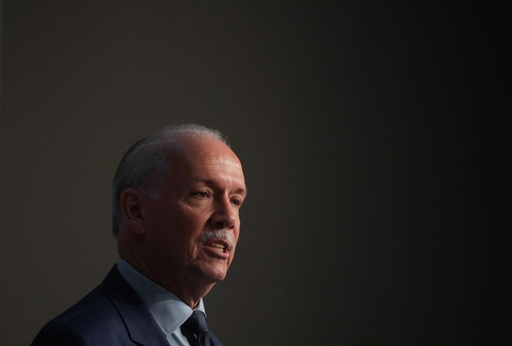 B.C. Premier John Horgan addresses the Union of B.C. Municipalities Convention, in Whistler, B.C., on Friday, Sept. 16, 2022. THE CANADIAN PRESS/Darryl Dyck.