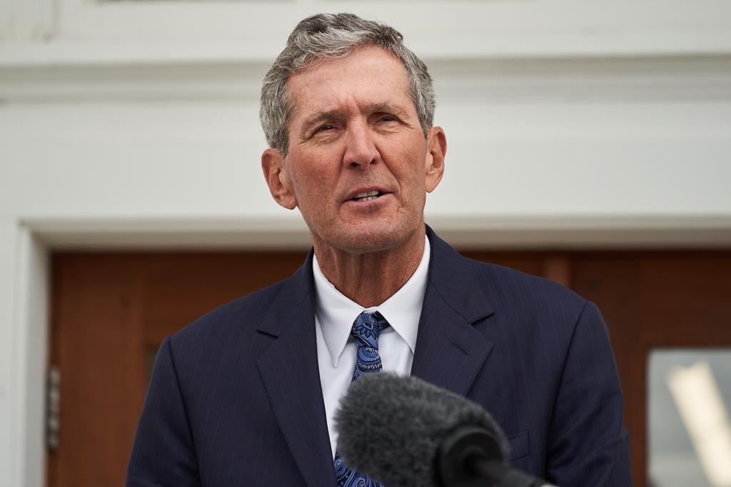 Manitoba Premier Brian Pallister makes an announcement in front of the Dome Building in Brandon, Man., Tuesday, Aug. 10, 2021. THE CANADIAN PRESS/David Lipnowski.
