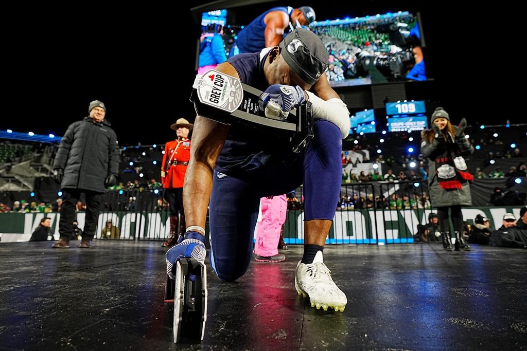 Toronto Argonauts linebacker Henoc Muamba celebrates after being named the Grey Cup’s Most Valuable Player and Most Valuable Canadian after defeating the Winnipeg Blue Bombers in the 109th Grey Cup at Mosaic Stadium in Regina, Sunday, Nov. 20, 2022. THE CANADIAN PRESS/Jonathan Hayward