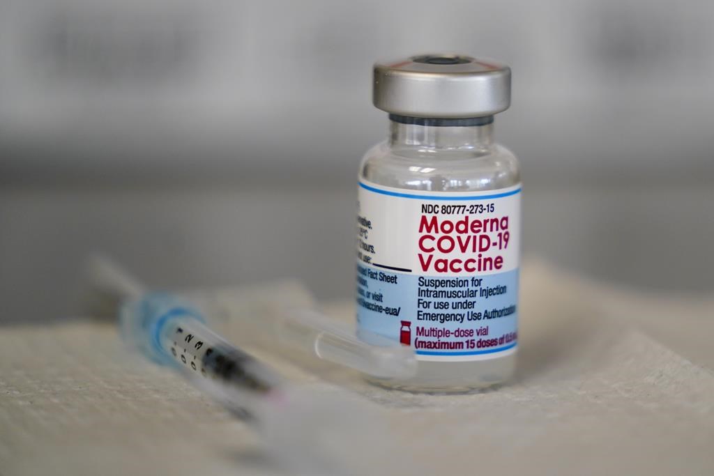 A vial of the Moderna COVID-19 vaccine seen at a vaccination clinic.