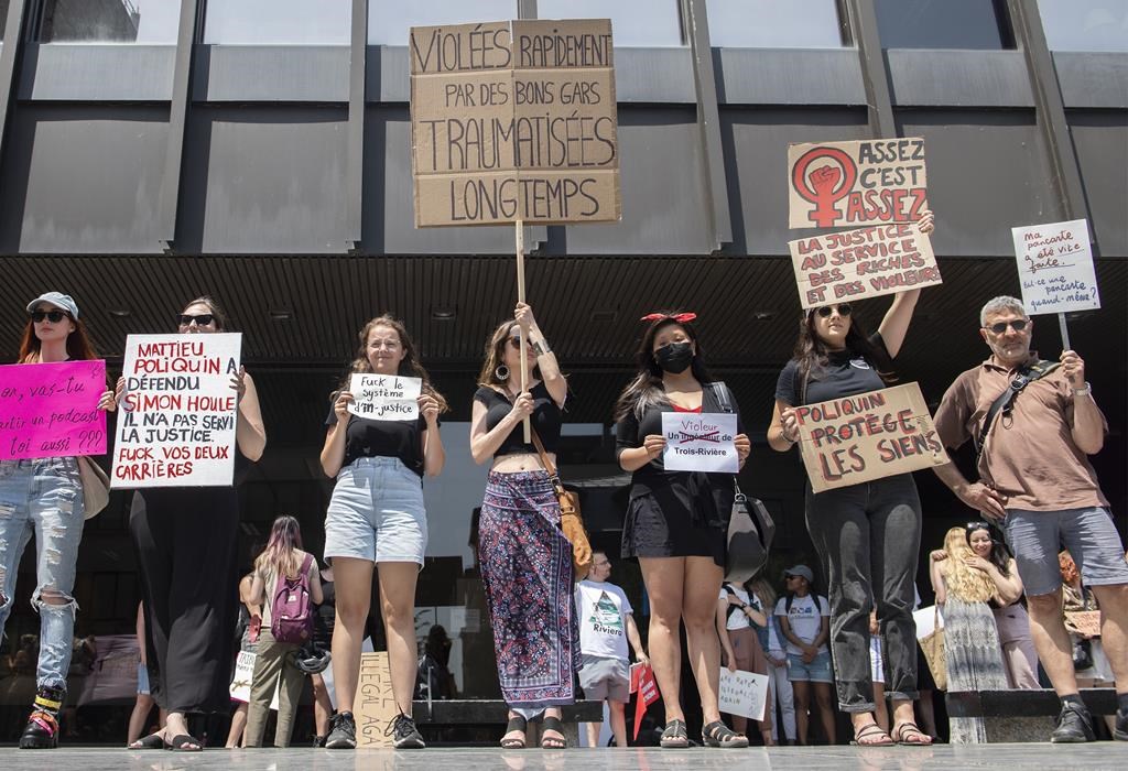 People take part in a protest against a decision by judge Matthieu Poliquin in the case against a man who pleaded guilty to sexual assault and voyeurism in Montreal, Sunday, July 10, 2022.