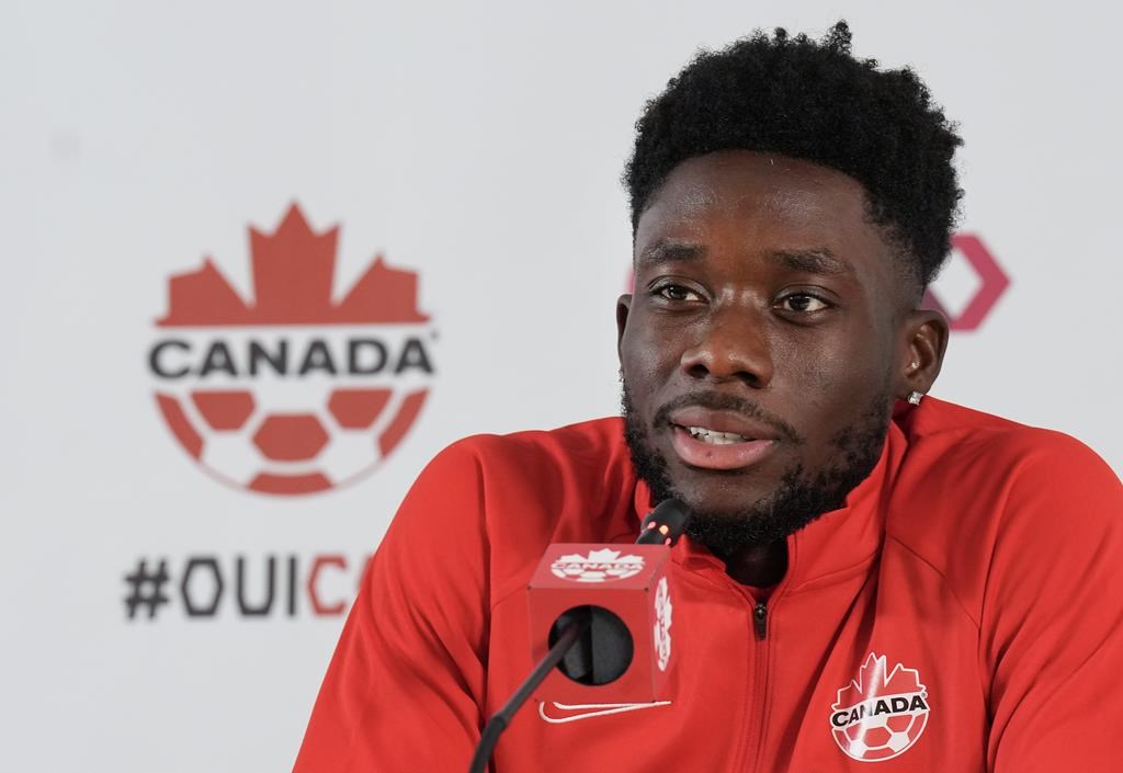 Canada forward Alphonso Davies speaks to the media after practice at the World Cup in Doha, Qatar on Nov. 29,.