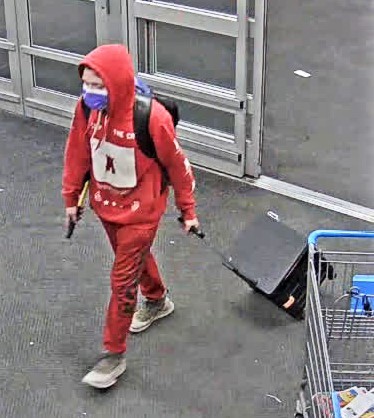 Police are seeking to identify a suspect after a robbery involving an axe was reported at a store in Toronto.
