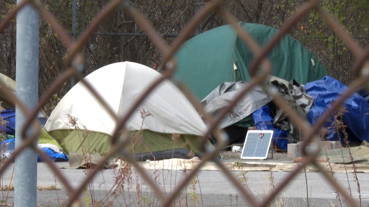 The city of Kingston has issued a trespass notice for two areas where tent cities have formed.