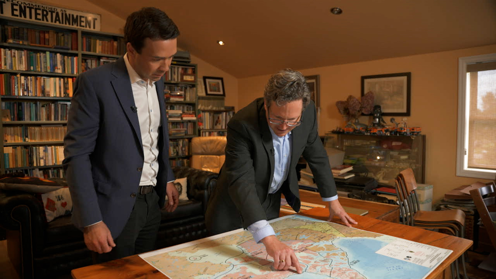 Arctic Expert Whitney Lackenbauer with The New Reality’s Jeff Semple, pointing to areas of the Arctic that could be contentious in a global power play of the region.