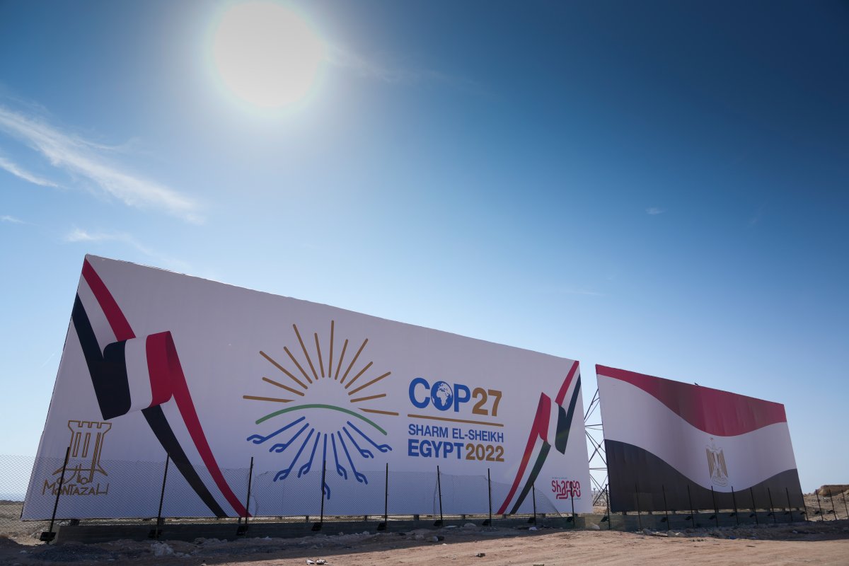 The COP27 U.N. Climate Summit logo and the Egyptian flag are displayed on a billboard lining a newly constructed highway in Sharm el-Sheikh, Egypt, Saturday, Nov. 5, 2022. The city will host the COP27 U.N. Climate Summit starting on Nov. 6, and scheduled to end on Nov. 18.
